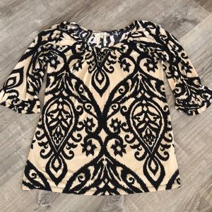 Boutique style ruffle/flare sleeve tunic.